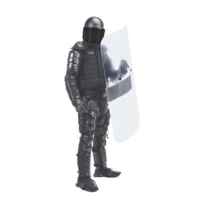 A person in a full-body riot suit holding a shield. 